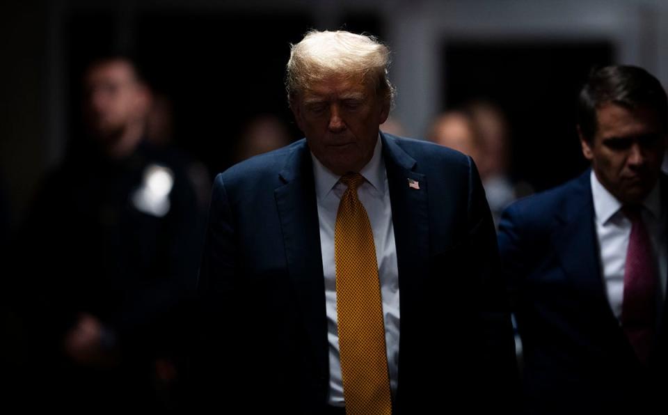 Former President Donald Trump walks out of the courtroom to make remarks to the media during his criminal trial at Manhattan Criminal Court on May 29, 2024 in New York City. Judge Juan Merchan will give the jury their instructions before they begin their deliberations today. The former president faces 34 felony counts of falsifying business records in the first of his criminal cases to go to trial.