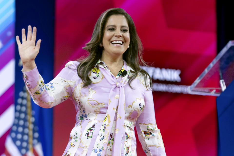 FILE - Republican Conference Chair Rep. Elise Stefanik, R-N.Y., waves to supporters at CPAC in Oxon Hill, Md., Feb. 23, 2024. Former President Donald Trump has narrowed his vice presidential shortlist to a handful of contenders that include Stefanik, as he prepares to announce his pick in the days before, or perhaps at, next month's Republican National Convention. Trump told reporters Saturday, June 22, that he already has made his decision and that that person will be in attendance Thursday night in Atlanta at the first debate of the general election campaign with Democratic President Joe Biden.(AP Photo/Jose Luis Magana, File)