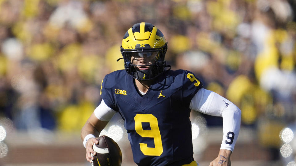 Michigan quarterback J.J. McCarthy (9) looks to throw against UNLV in the first half of an NCAA college football game in Ann Arbor, Mich., Saturday, Sept. 9, 2023. (AP Photo/Paul Sancya)