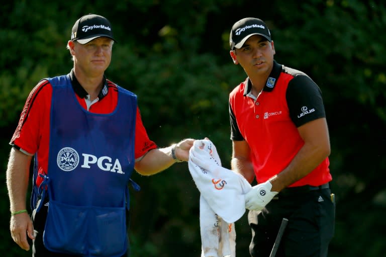 Jason Day of Australia and caddie Colin Swatton during the 2016 PGA Championship on July 29, 2016 in Springfield, New Jersey