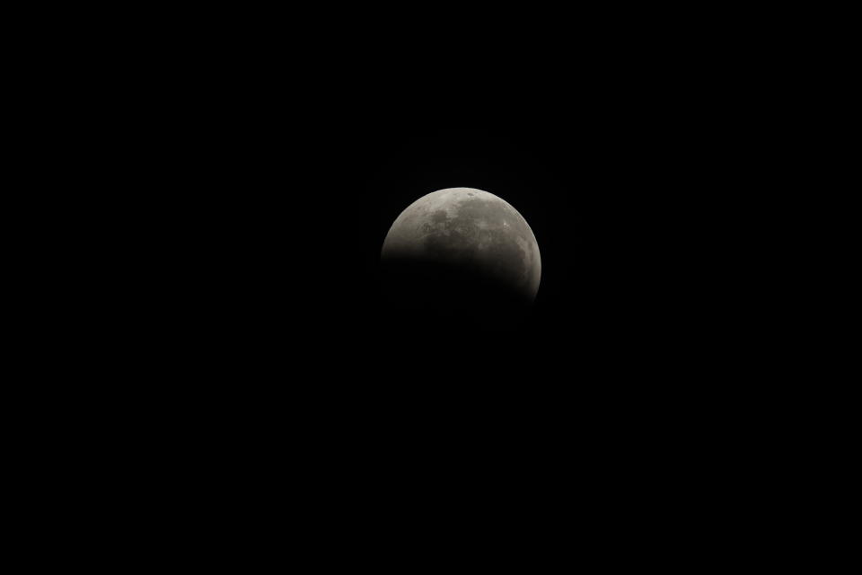 <p>The moon as seen from Marina South Pier in Singapore on 28 July 2018 during a total lunar eclipse. (PHOTO: Michael Mathews) </p>