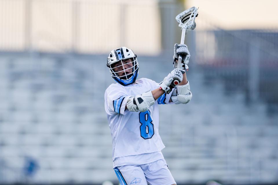 Sky View’s Easton Ballard (8) prepares to pass during the 4A boys lacrosse championships at Zions Bank Stadium in Herriman on May 26, 2023. | Ryan Sun, Deseret News