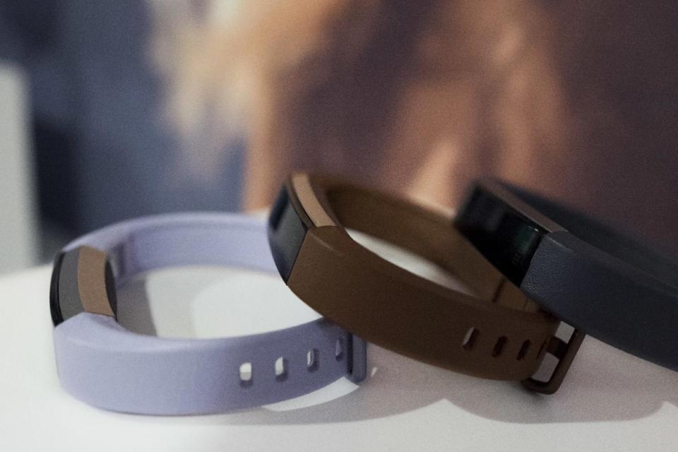 In this March 1, 2017 photo in New York, Fitbit's new Alta HR is shown in several colors. The new sleep tools come as Fitbit announces an updated version of its Alta tracker. The new version has heart rate monitoring and seven days of battery life. It goes on sale in April for about $150. (AP Photo/Mark Lennihan)