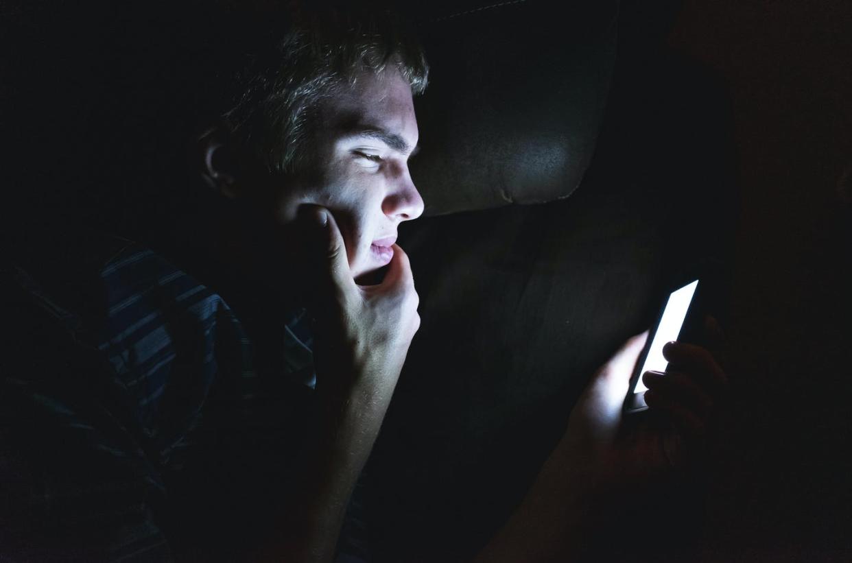 <span class="caption">The technology isn't the problem. </span> <span class="attribution"><a class="link " href="https://www.shutterstock.com/image-photo/curious-teenager-browsing-internet-on-his-1239519538" rel="nofollow noopener" target="_blank" data-ylk="slk:mooremedia via Shutterstock;elm:context_link;itc:0;sec:content-canvas">mooremedia via Shutterstock</a></span>
