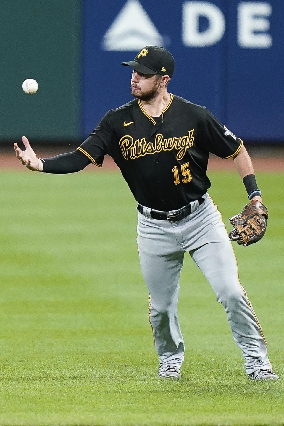 Pittsburgh Pirates shortstop JT Riddle fields the ball before throwing out Cincinnati Reds' Freddy Galvis at first base during the sixth inning of a baseball game in Cincinnati, Tuesday, Sept. 15, 2020. (AP Photo/Bryan Woolston)