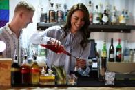 <p>She looked like an expert bartender. </p>