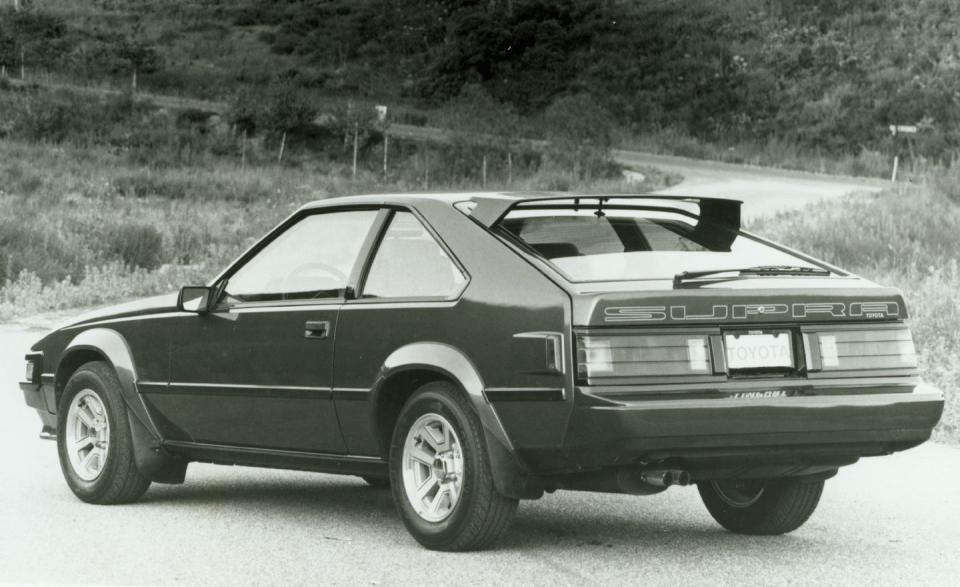 <p>The second-gen Celica Supra bows for the 1982 model year and swaps the old model’s live rear axle for independent semi-trailing arms, a setup that helps earn it fourth place-beating a Ferrari, a Lotus, and two Porsches-in <a rel="nofollow noopener" href="https://www.caranddriver.com/comparisons/toyota-celica-supra-page-8" target="_blank" data-ylk="slk:a 1984 Car and Driver comparison test;elm:context_link;itc:0;sec:content-canvas" class="link ">a 1984 <em>Car and Driver</em> comparison test</a> seeking the best-handling imported car. And in 1985, <a rel="nofollow noopener" href="https://www.caranddriver.com/comparisons/1985-chevy-camaro-berlinetta-vs-1985-ford-mustang-svo-comparison-test-toyota-supra-page-8" target="_blank" data-ylk="slk:the Toyota finishes second;elm:context_link;itc:0;sec:content-canvas" class="link ">the Toyota finishes second</a> to the Audi Coupe GT in an eight-car battle to determine the best sports coupe in America. Underhood, a new twin-cam 2.8-liter inline-six corrals 145 horses, making it 29 ponies stronger than the single-cam unit it replaced.</p>