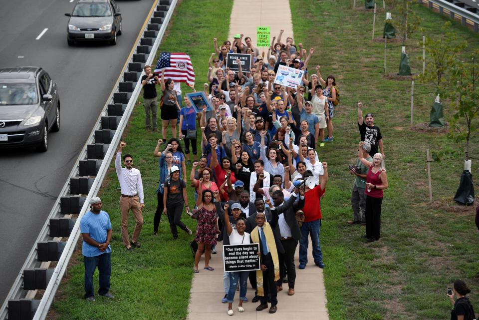 <p>Participants of “Charlottesville to D.C: The March to Confront White Supremacy” pose for a picture as they walk on Emmet Street N during a ten-day trek to the nation’s capital from Charlottesville, Va., Aug. 28, 2017. (Photo: Sait Serkan Gurbuz/Reuters) </p>