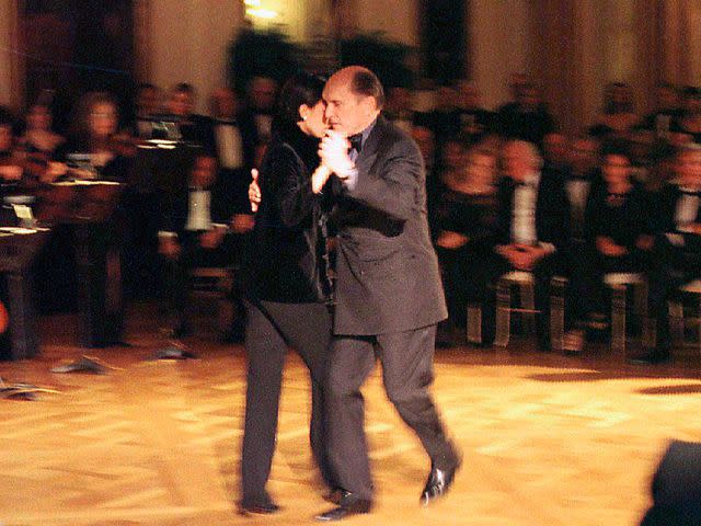 <p>Pool / Epix / GAMMA LIAISON / Getty</p> Robert Duvall dances with Luciana Pedraza as the entertainment for the White House State Dinner for Argentine President Carlos Menem on January 11, 1999.