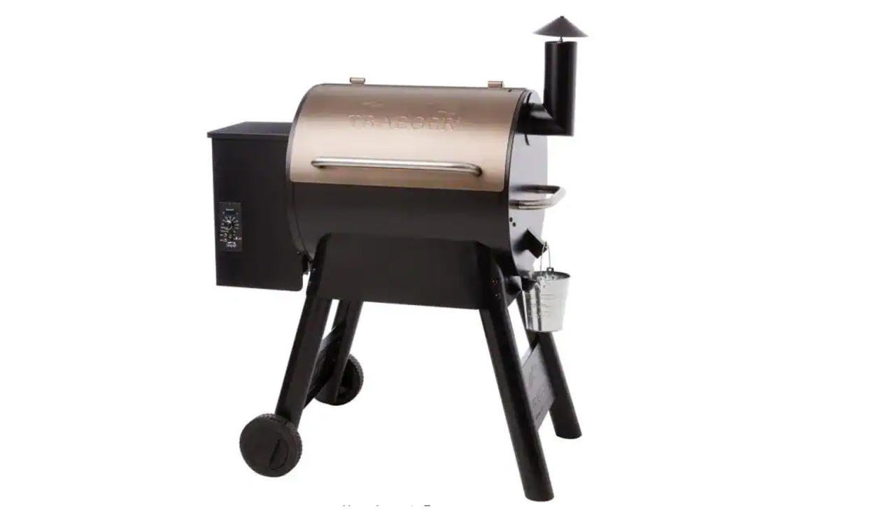 This Traeger grill uses wood pellets and is beloved for its smoking abilities. (Photo: The Home Depot)