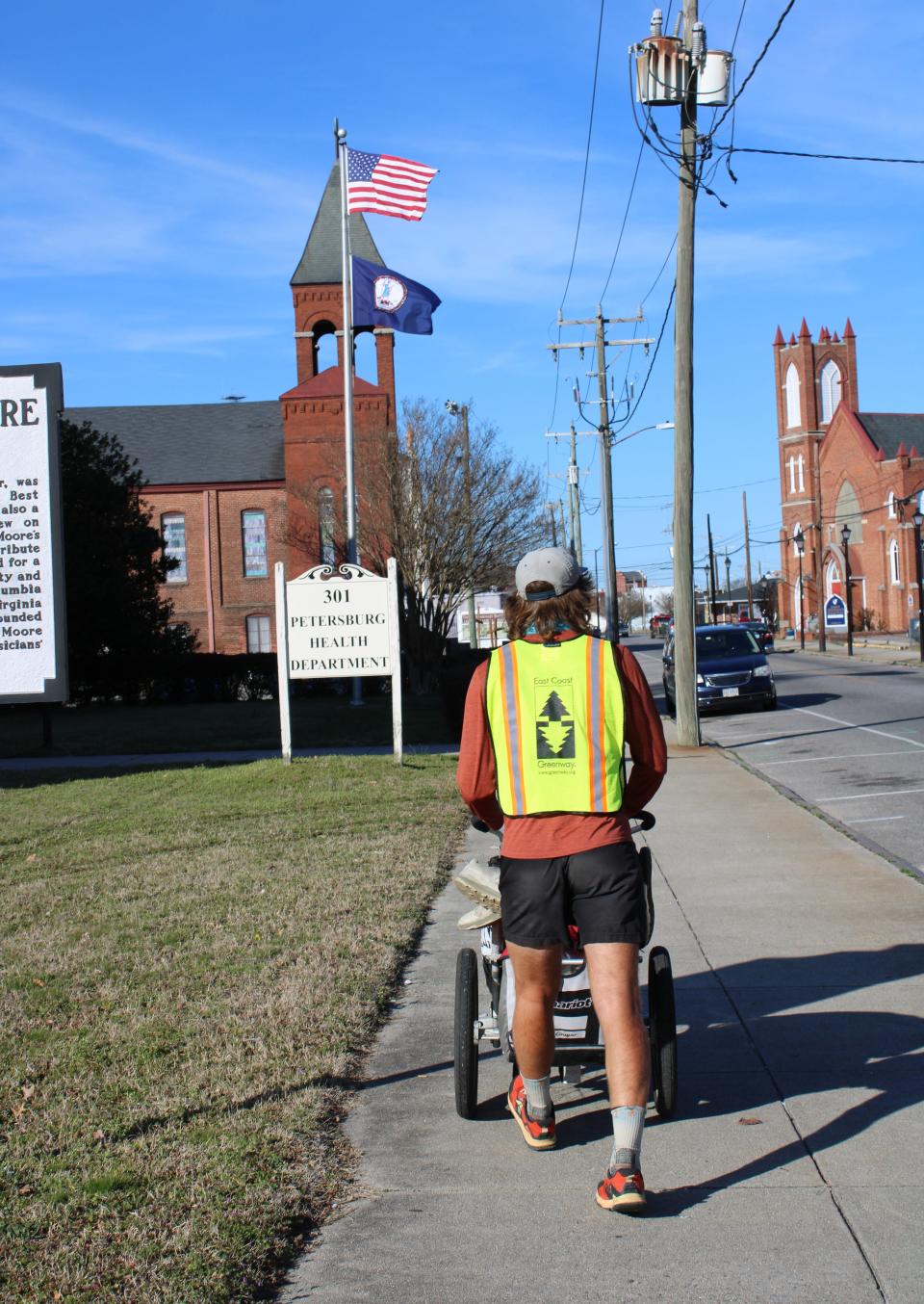 Holden Minor Ringer walks along South Market Street in Petersburg on Feb. 29, 2024.