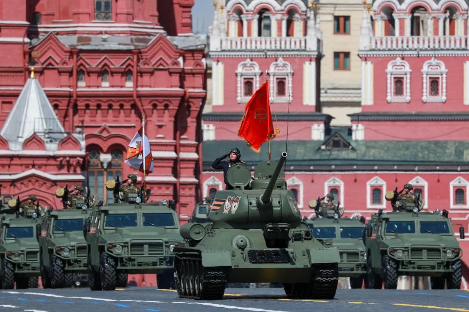 Tanks roll in a military parade on Red Square in Moscow.