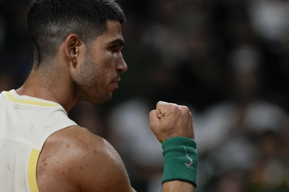 Carlos Alcaraz, of Spain, celebrates a point during an Argentina Open ATP quarterfinal tennis match against Andrea Vavassori, of Italy, in Buenos Aires, Argentina, Friday, Feb. 16, 2024. (AP Photo/Natacha Pisarenko)