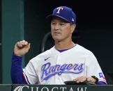 FILE - Texas Rangers bench coach Don Wakamatsu reacts in the fifth inning of a baseball game against the Colorado Rockies in Arlington, Texas, Aug. 30, 2021. Businessmen Bryan Carmel and Paul Freedman have founded an expansion independent club that will play in the Pioneer League beginning in May 2024, and veteran manager and Bay Area native Wakamatsu is running the baseball operations side. (AP Photo/Tony Gutierrez, File)