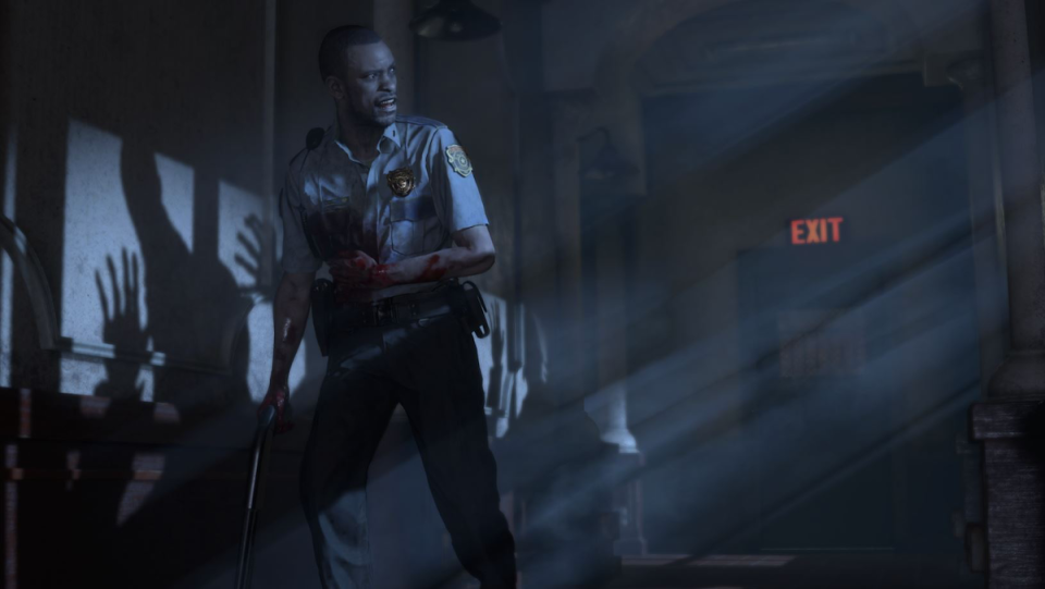 Resident Evil's Marvin Branagh stands in the shadows as something pursues him.