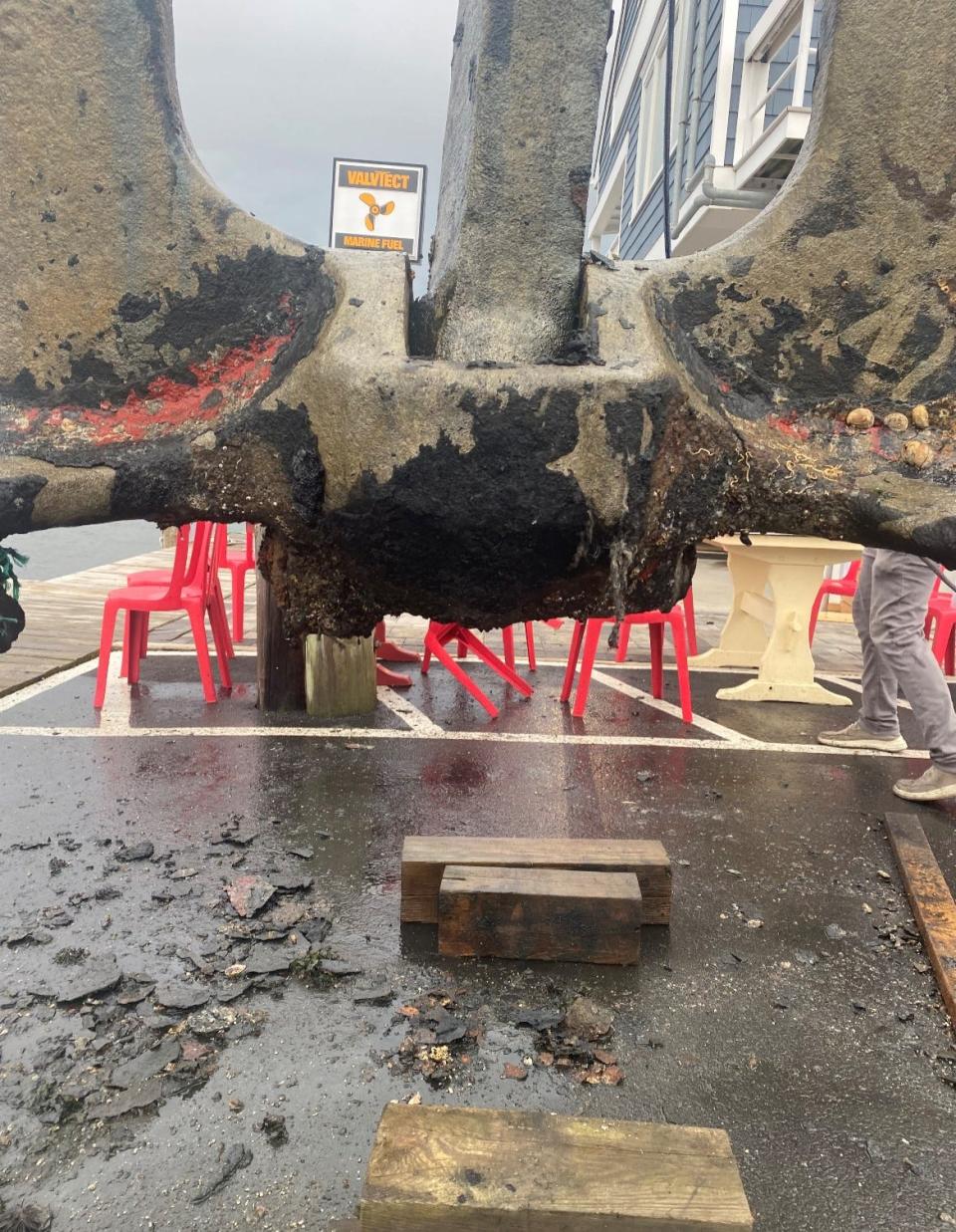 A 5-ton Baldt anchor that belonged to the Morro Castle is lifted out of the water at Captain Bill's Landing in Point Pleasant Beach, where it is being stored.