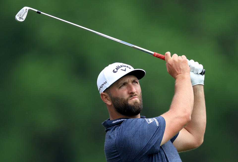 AUGUSTA, GEORGIA - APRIL 06: John Rahm of Spain plays his tee shot on the 12th hole during the first round of the 2023 Masters Tournament at Augusta National Golf Club on April 06, 2023 in Augusta, Georgia. (Photo by David Cannon/Getty Images)