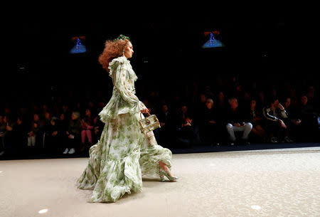 A model presents a creation from the Dolce & Gabbana Autumn/Winter 2018 women's collection during Milan Fashion Week in Milan, Italy February 25, 2018. REUTERS/Alessandro Garofalo