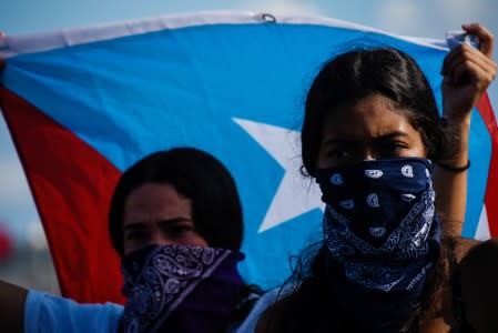 Demonstrators take part in the National Strike calling for the resignation of Governor Ricardo Rossello in San Juan