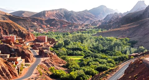 A view of the city of Tamellalt against the Atlas Mountains in Morocco - Credit: AP