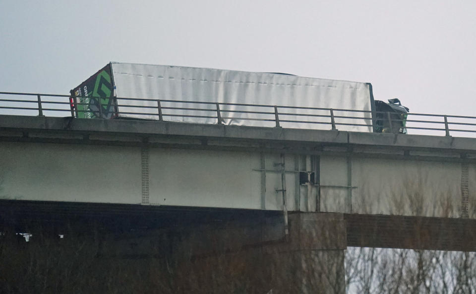 An overturned vehicle on the M60, near Trafford Park in Manchester, after Storm Franklin moved in overnight, just days after Storm Eunice destroyed buildings and left 1.4 million homes without power. Picture date: Monday February 21, 2022.