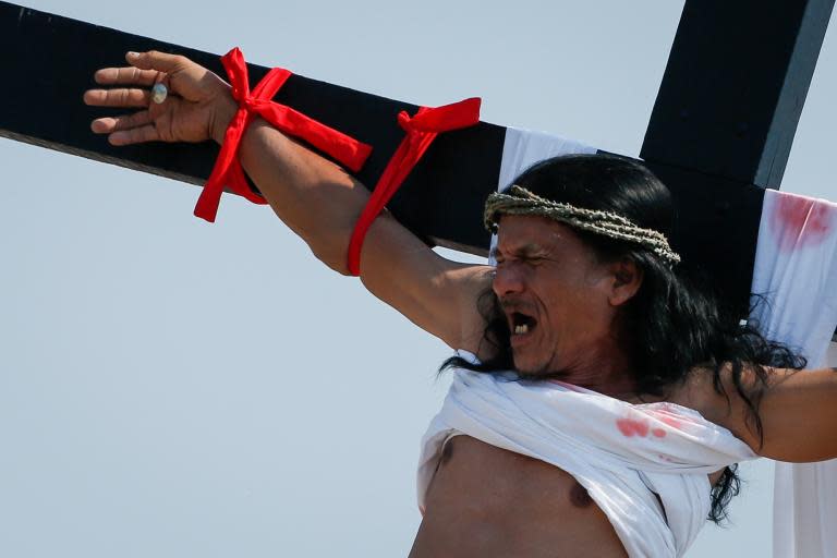 Easter: People nailed to crosses while others beat themselves in blood-soaked religious ceremonies