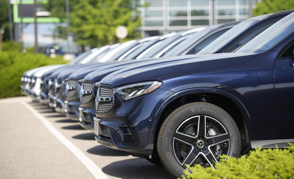 A long row of unsold 2023 sports-utility vehicles sits at a Mercedes Benz dealership Tuesday, Aug. 8, 2023, in Loveland, Colo. On Thursday, the Labor Department releases the producer price index for August, an indicator of inflation at the wholesale level. (AP Photo/David Zalubowski)