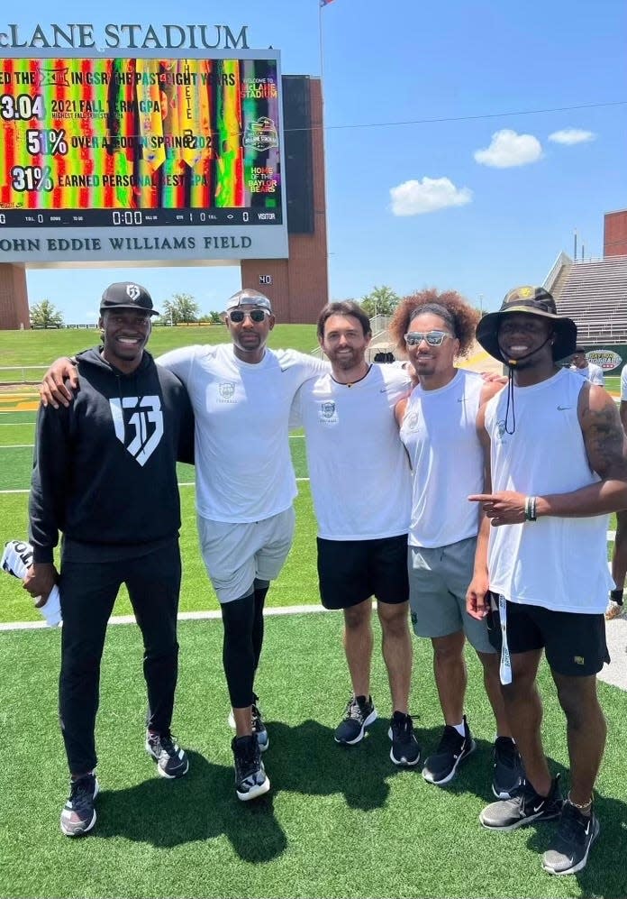 From left, Baylor legend Robert Griffin III, coach Dallas Baker and receivers Mike Tripp Mitchell, Jonah Burton and Cameron Bonner.