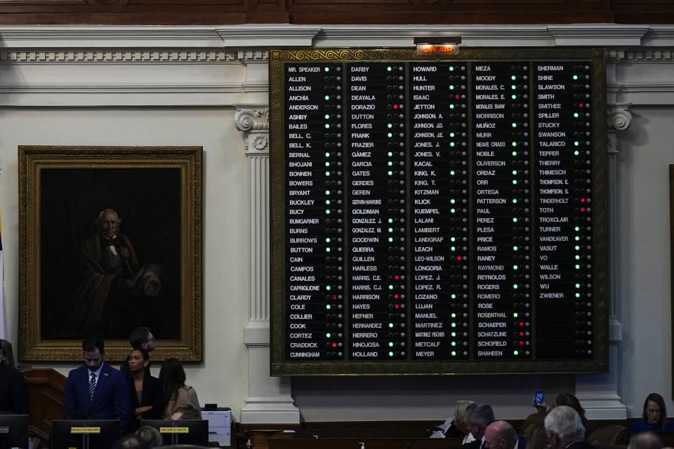 The voting board is lit with a majority of green lights as the house votes to impeach state Attorney General Ken Paxton in the House Chamber at the Texas Capitol in Austin, Texas, Saturday, May 27, 2023. Texas lawmakers have issued 20 articles of impeachment against Paxton, ranging from bribery to abuse of public trust as state Republicans surged toward a swift and sudden vote that could remove him from office. (AP Photo/Eric Gay)