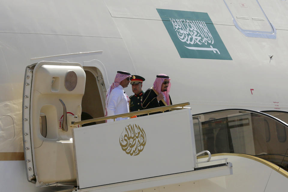 Saudi Arabia's King Salman, right , arrives in Amman Jordan, Monday, March 27, 2017. Salman is in Jordan to attend the annual Arab Summit, to be held on Wednesday. Issues on the summit agenda include conflicts in Syria, Libya and Yemen. Saudi Arabia is an important financial backer of Jordan. (AP Photo/ Raad Adayleh)