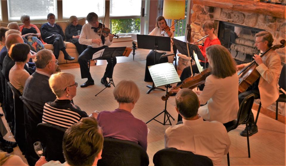 Chamber music fans take in an intimate Midsummer's Music concert at a private Door County residence. Midsummer's announced it is offering its first-ever fall concert series, an Autumn Music Fest running from Sept. 30 to Oct. 15.