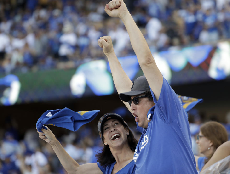 Fans cheer before Game 1 of baseball’s World Series between the Los Angeles Dodgers and the Houston Astros Tuesday, Oct. 24, 2017, in Los Angeles. (AP Photo/Matt Slocum)