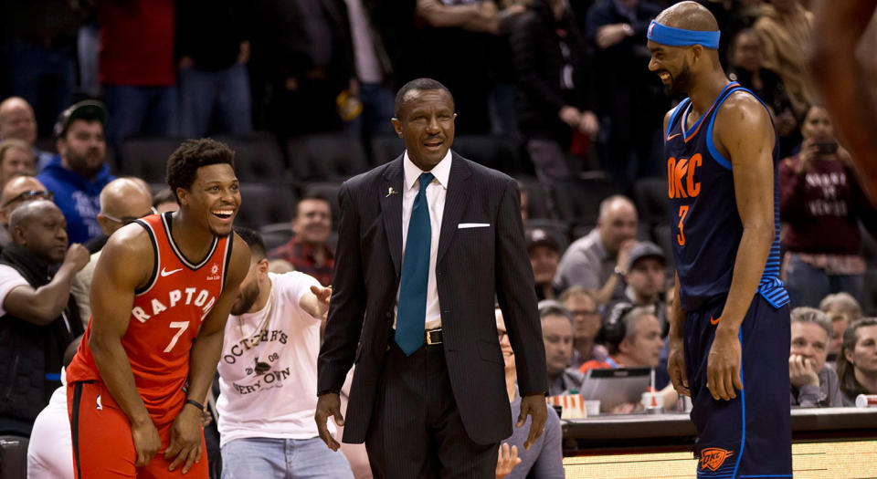 Kyle Lowry, Dwane Casey and Corey Brewer react in amazement to Casey’s ejection. (Lucas Oleniuk/Toronto Star via Getty Images)