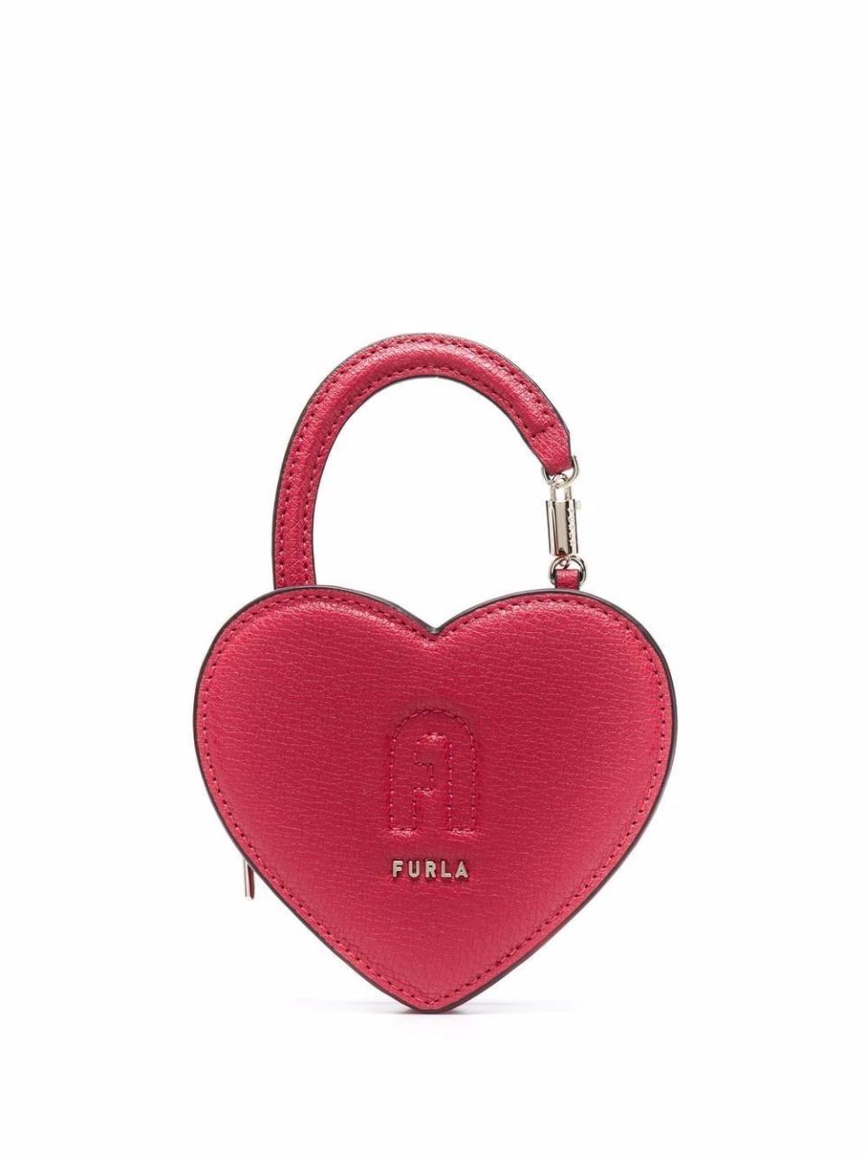 <p><strong>Furla</strong></p><p>farfetch.com</p><p><strong>$120.00</strong></p><p><a href="https://go.redirectingat.com?id=74968X1596630&url=https%3A%2F%2Fwww.farfetch.com%2Fshopping%2Fwomen%2Ffurla-heart-shaped-purse-item-17715321.aspx&sref=https%3A%2F%2Fwww.cosmopolitan.com%2Fstyle-beauty%2Ffashion%2Fg37640984%2Fspring-2022-bag-trends%2F" rel="nofollow noopener" target="_blank" data-ylk="slk:Shop Now;elm:context_link;itc:0;sec:content-canvas" class="link ">Shop Now</a></p><p>This cutie heart shape purse will look good with any outfit. </p>