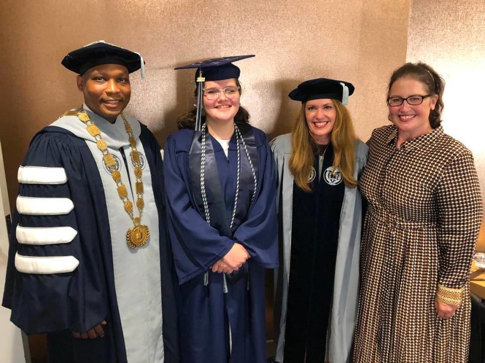 Sawsan Ahmed poses with Broward College President Gregory Adam Haile, commencement speaker and CEO of Magic Leap, Peggy Johnson, and her mom, Jeena Santos Ahmed.