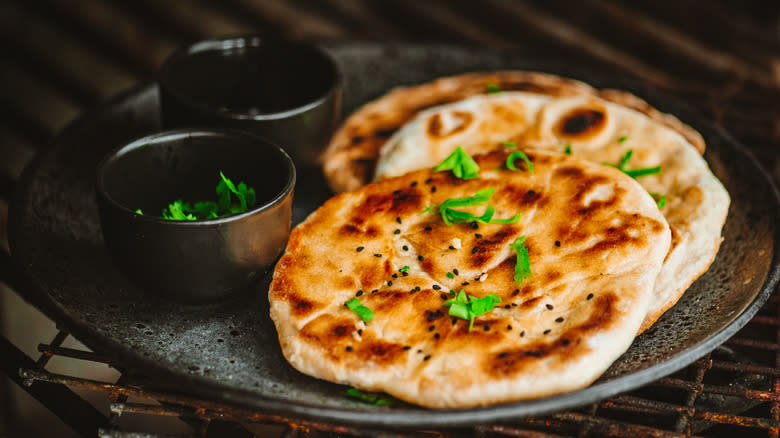 naan on a plate with garnish