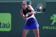 Mar 26, 2018; Key Biscayne, FL, USA; Garbine Muguruza of Spain hits a backhand against Sloane Stephens of the United States (not pictured) on day seven of the Miami Open at Tennis Center at Crandon Park. Stephens won 6-3, 6-4. Mandatory Credit: Geoff Burke-USA TODAY Sports