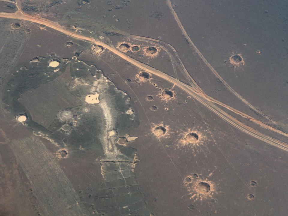 Bomb craters in the Laos region of Xiang Khwang.