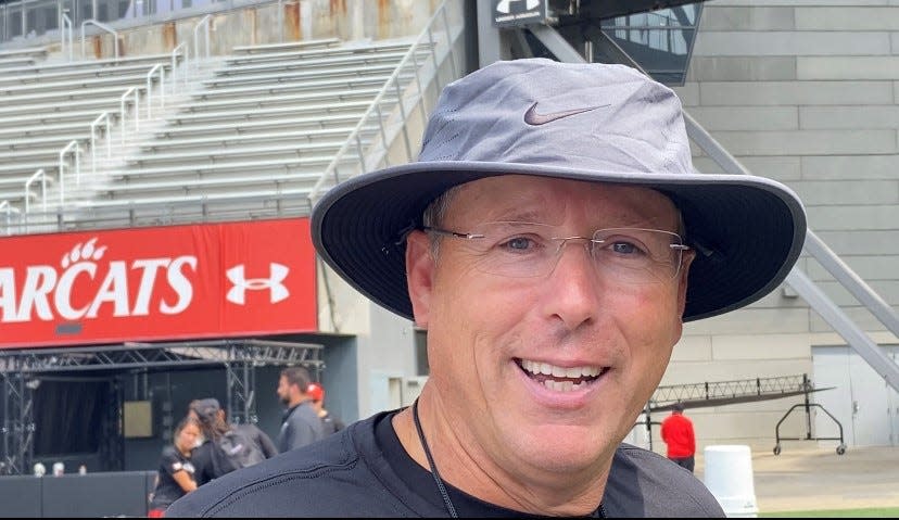 UC head football coach Scott Satterfield opted for the Nike bucket hat over the visor on their first day of training camp Wednesday, Aug. 2 at Nippert Stadium.