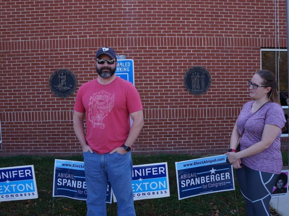 Joel, a 40-year-old voter from Woodbridge, VA stands in line at an early voting site on Saturday, Nov. 5.