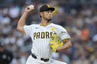 San Diego Padres starting pitcher Yu Darvish works against a Cincinnati Reds batter during the first inning of a baseball game, Tuesday, April 30, 2024, in San Diego. (AP Photo/Gregory Bull)