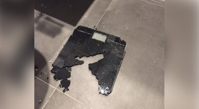 Photos show the entire centre of the digital scales missing and hundreds of glass chunks on the floor. Photo: Supplied