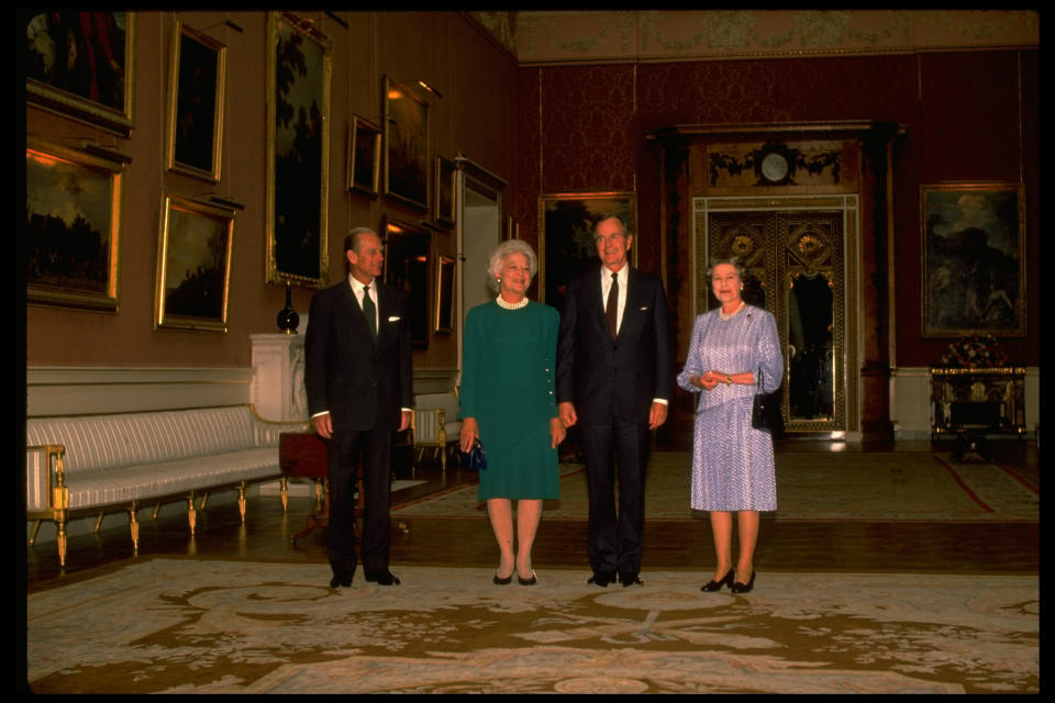 President George H. W. Bush and signature-pearls-sporting Barbara Bush with. Queen Elizabeth II & Prince Philip, at Buckingham Palace, London, England on June 1, 1989