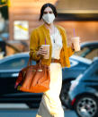 <p>Scout Willis double fists two coffees while out in L.A. on Tuesday.</p>