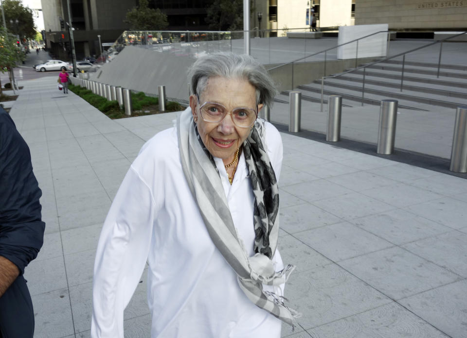 FILE - In this Aug. 29, 2017, file photo, Waverly Scott Kaffaga, stepdaughter of author John Steinbeck, leaves federal court in downtown Los Angeles. A federal appeals court has thrown out $8 million in punitive damages against the daughter-in-law of author John Steinbeck in her long-running copyright spat with the late author's step-daughter. The 9th U.S. Circuit Court of Appeals on Monday, Sept. 9, 2019, upheld a $5 million verdict against Gail Steinbeck and told her it's time to end her legal saga. Kaffaga, whose mother Elaine was married to Steinbeck when he died in 1968, won a lawsuit two years ago showing Gail Steinbeck meddled with plans to make money off his most famous works. (AP Photo/Brian Melley, File)