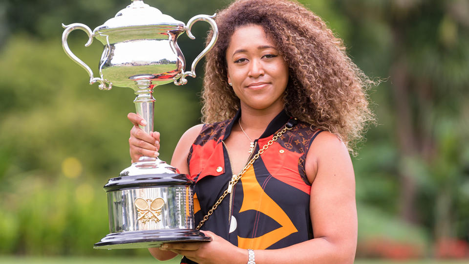 Naomi Osaka, pictured here with the Daphne Akhurst Memorial Trophy after winning the Australian Open.