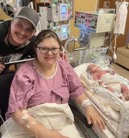 <p>Danielle Wiebusch</p> Hunter and Danielle Wiebusch with newborn daughter Hallie at Children's Minnesota in April 2023