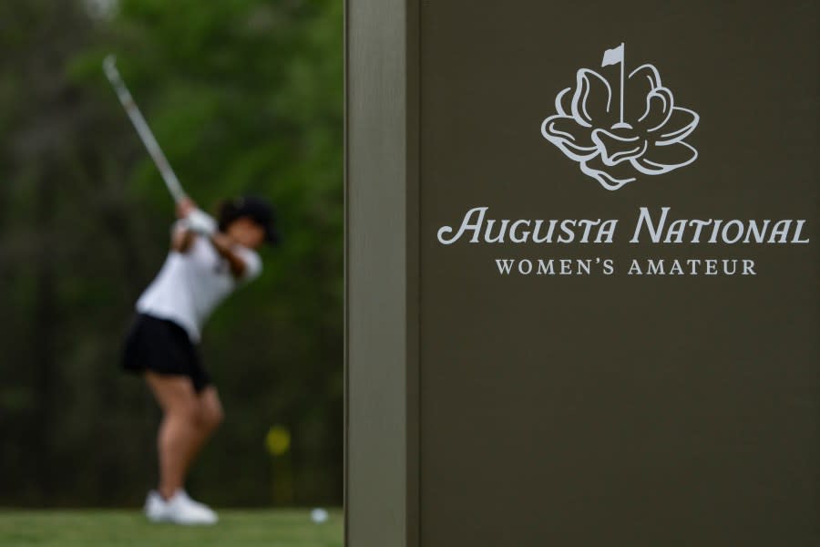 Detail of Augusta National Women’s Amateur signage as Lauren Kim of Canada practices on the driving range prior to the Augusta National Women’s Amateur at Champions Retreat Golf Club, Monday, April 1, 2024. (Photo courtesy: Augusta National Golf Club)