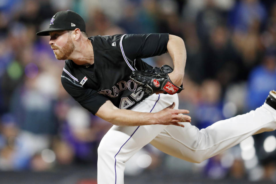 FILE - In this June 1, 2019, file photo, Colorado Rockies relief pitcher Scott Oberg follows through with a pitch against the Toronto Blue Jays during the ninth inning of a baseball game in Denver. Oberg is steadily making his way back to the mound after sitting out last season due to blood clots in his pitching arm. it was the third time over his career the clots have surfaced. (AP Photo/David Zalubowski, File)