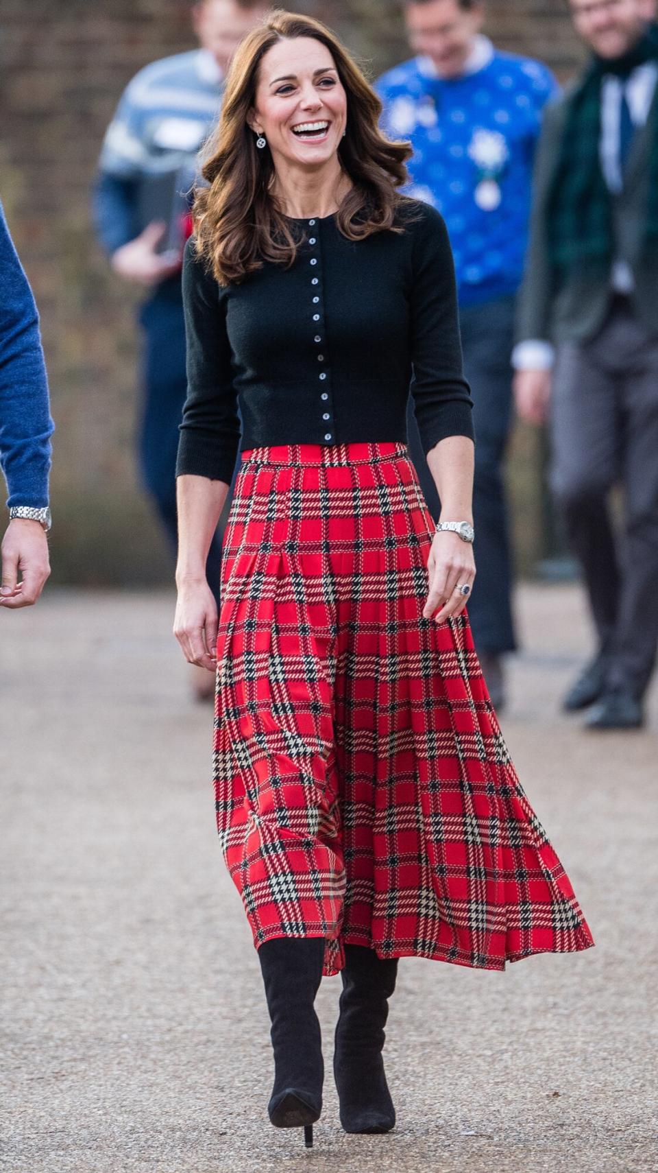 Catherine, Duchess of Cambridge attends a party for families of military personnel deployed in Cyprus at Kensington Palace on December 04, 2018 in London, England